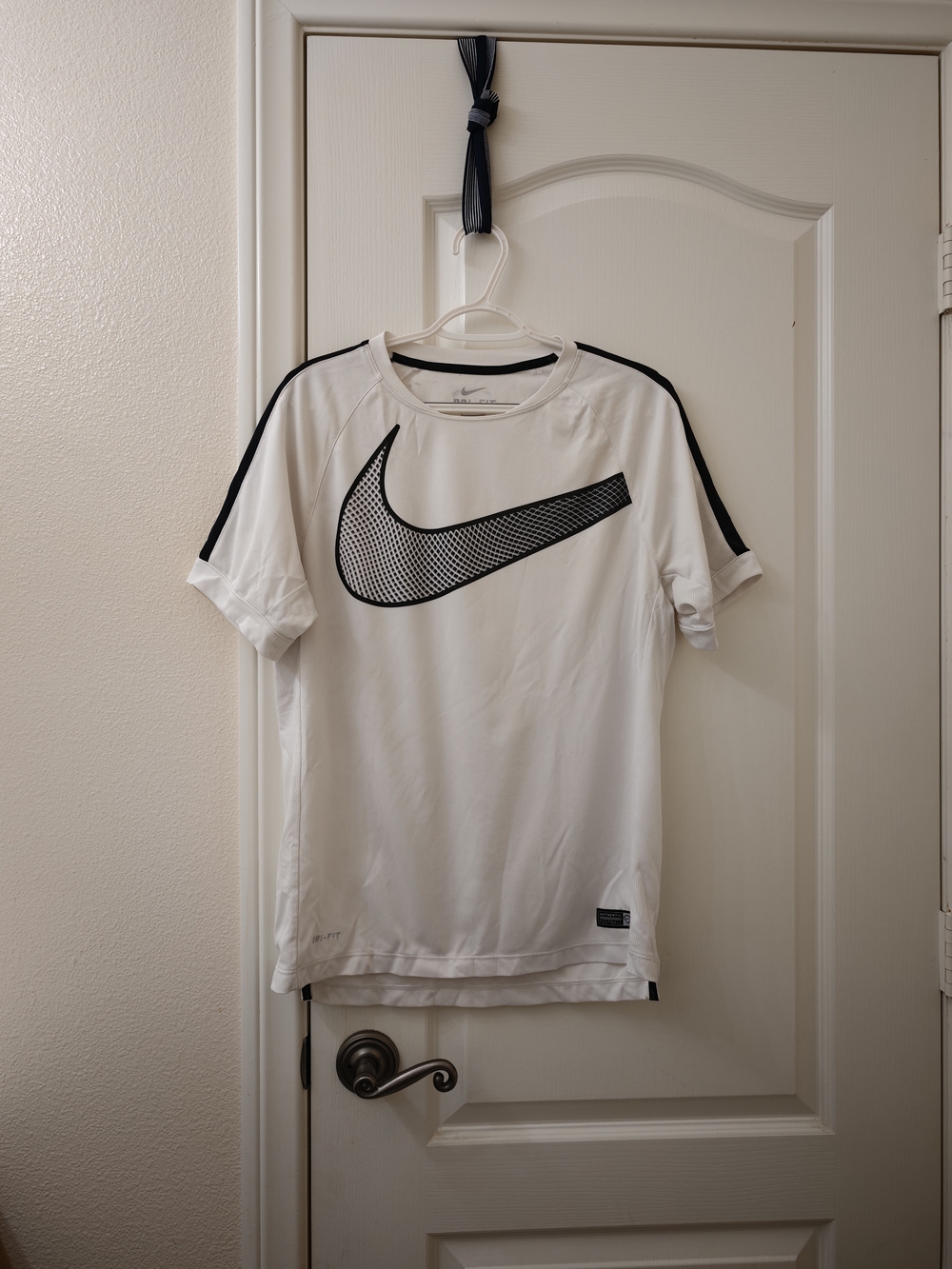 Nike White Short-Sleeve Performance Tee with Black Swoosh